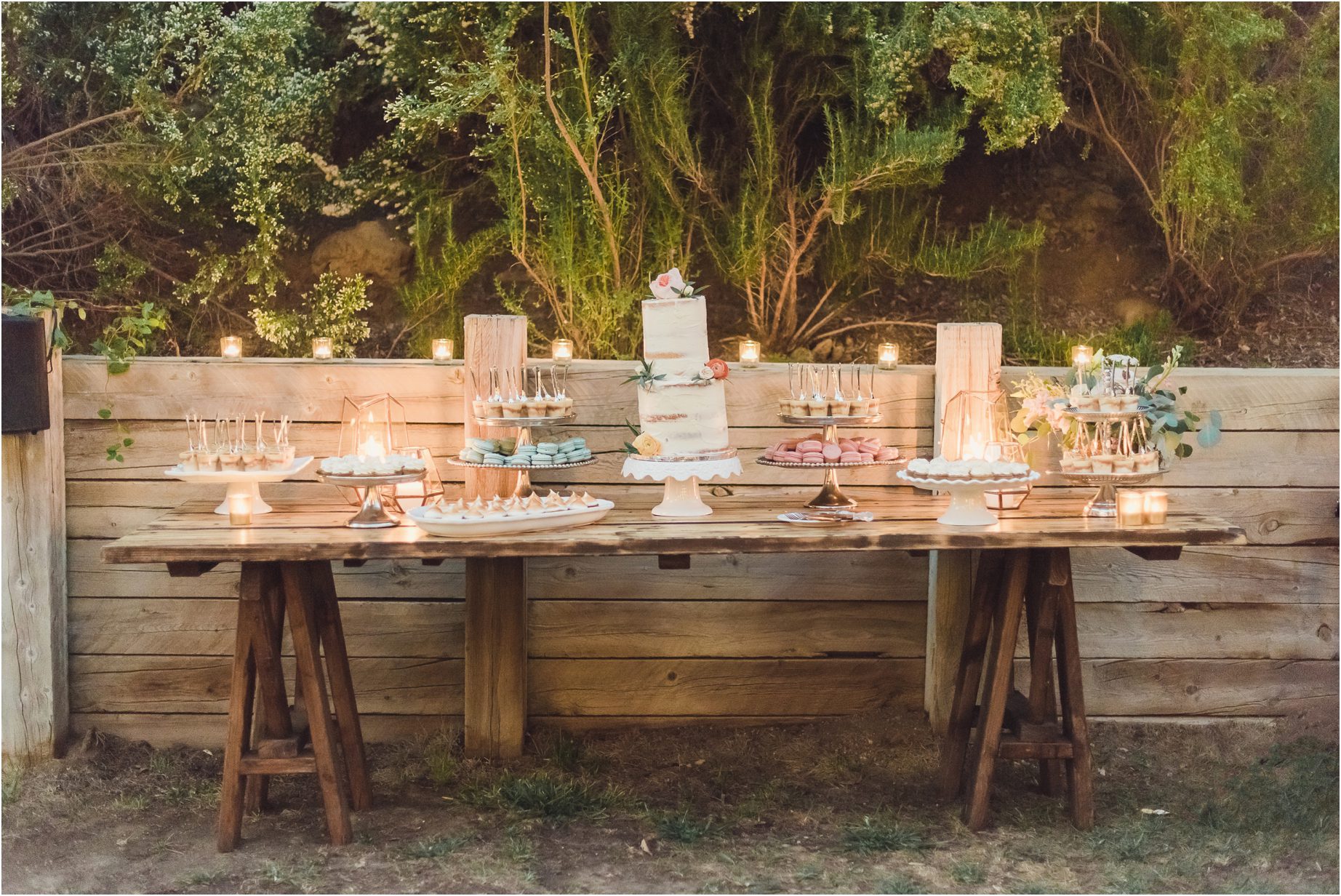 a wedding cake and favors at a Malibu wedding