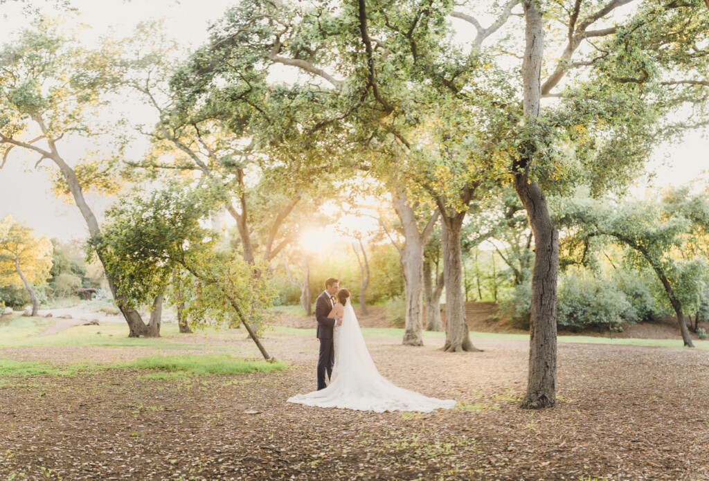 A bride and Groom in the oak Garden at their Descanso Gardens wedding