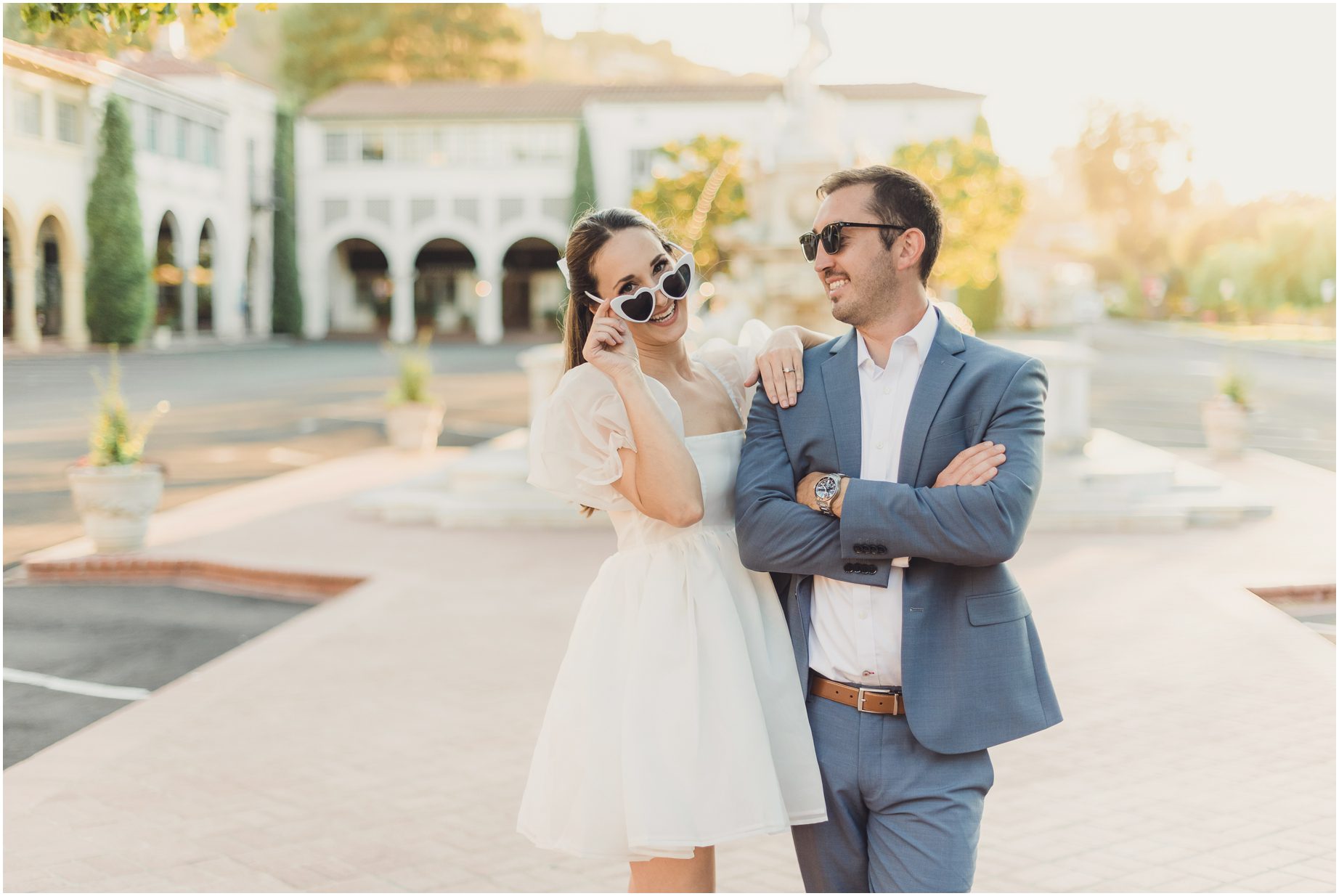 A man and woman pose at Malaga Cove Plaza Mini Sessions