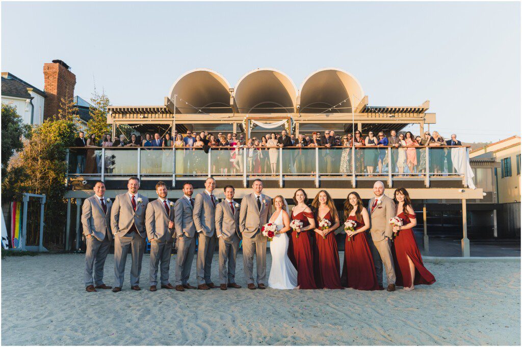 A bridal party poses for portraits at Malibu west beach club