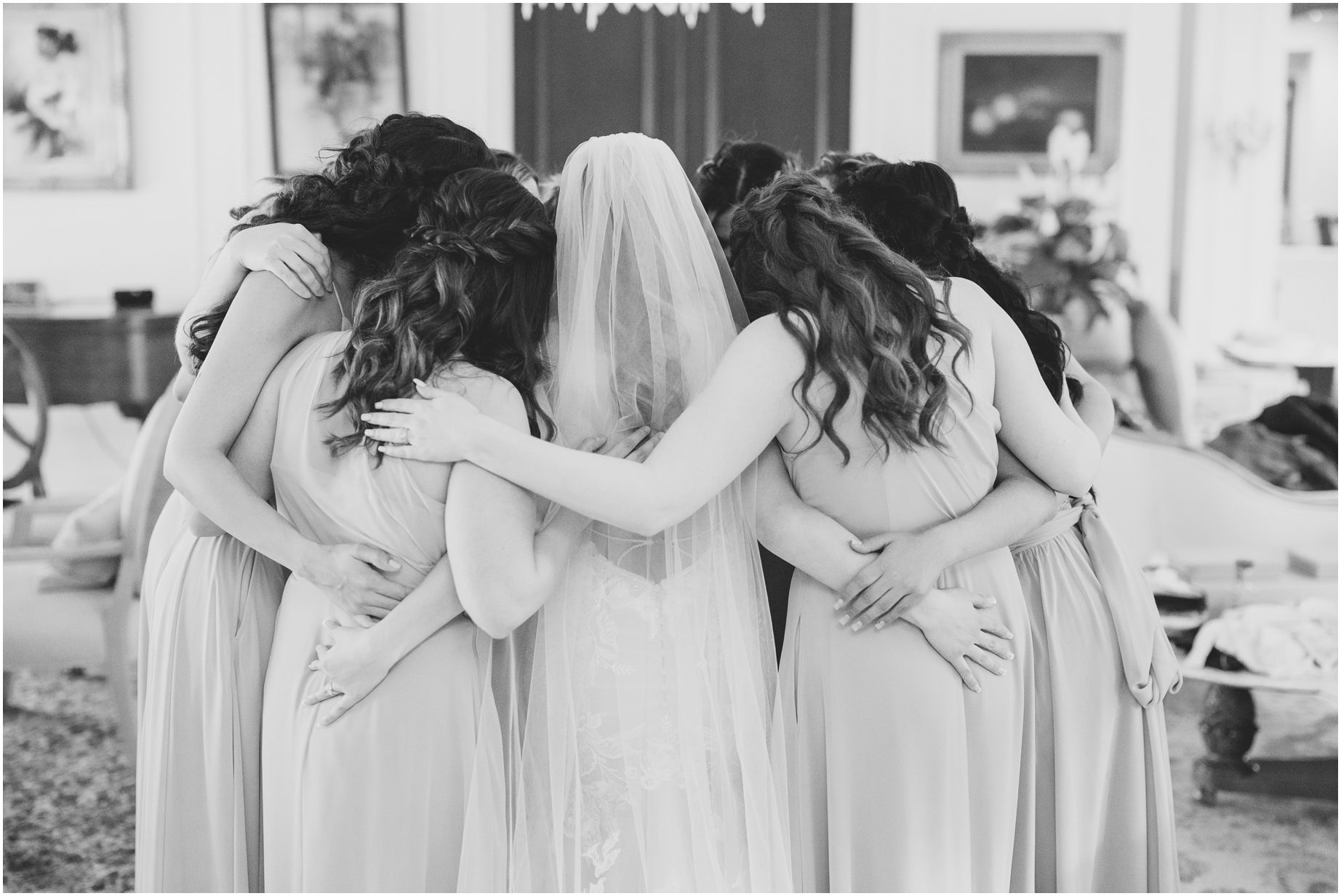 A bride spends a moment with her bridesmaids at khyra beaucrest ranch