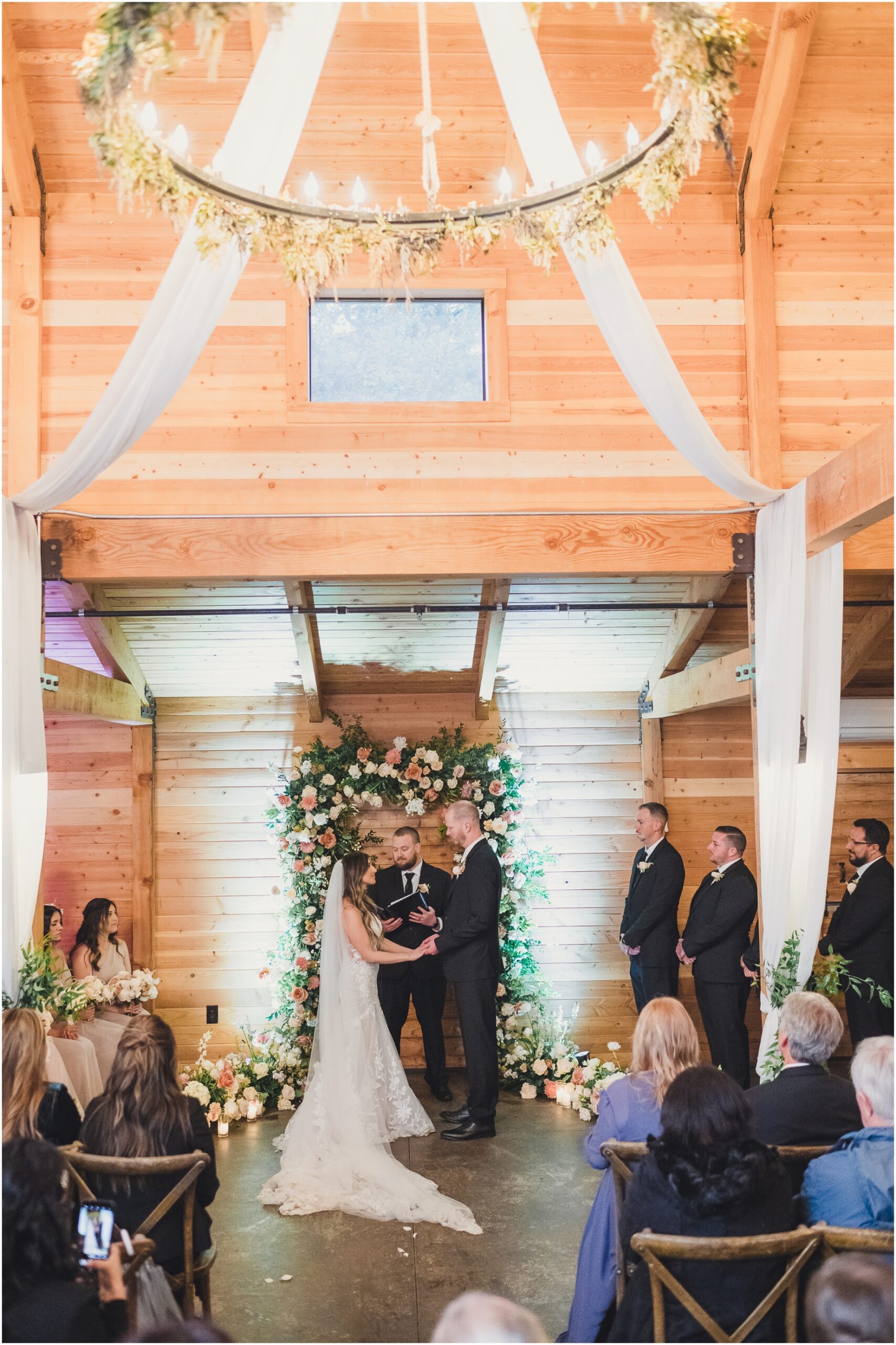 The inside of the Serendipity Garden Weddings' Barn, featuring a wedding