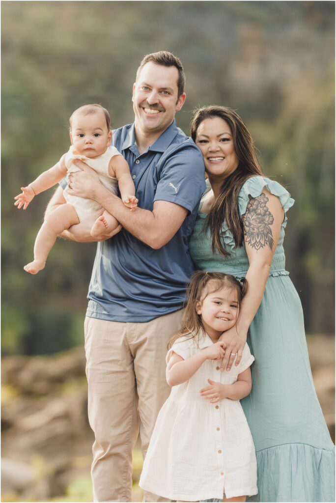 A family poses for Family Photos at Elk Rock Island in Lake Oswego, Oregon