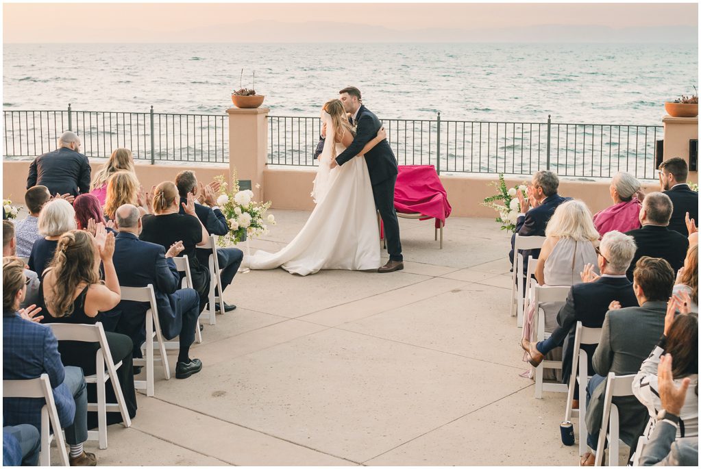 Bride and groom first kiss at PV athletic club