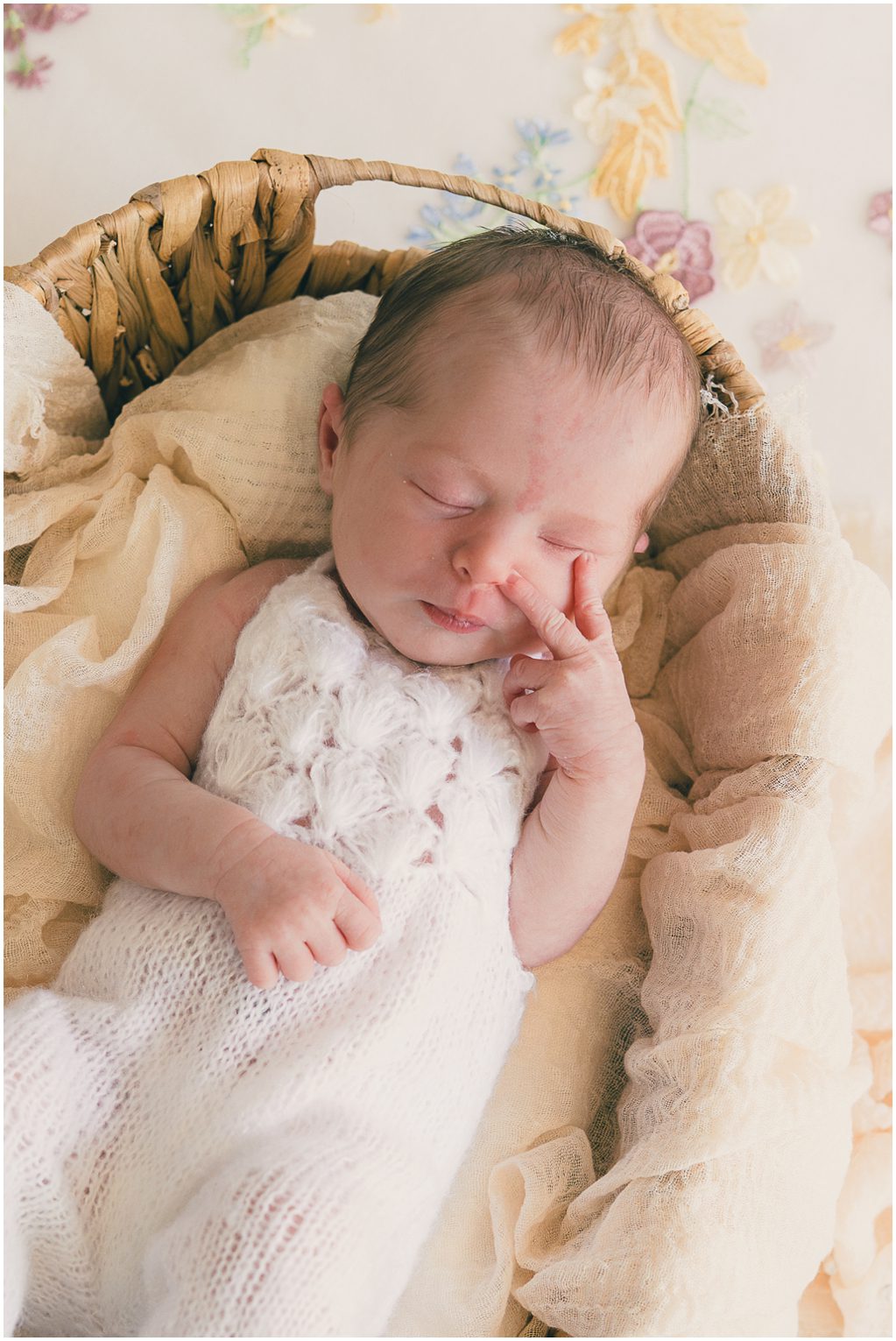 Baby throwing up the peace sign