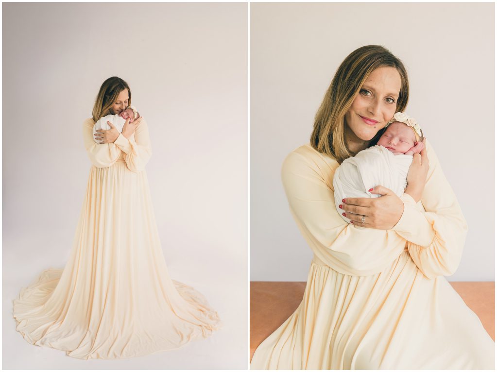 proud mama holds baby