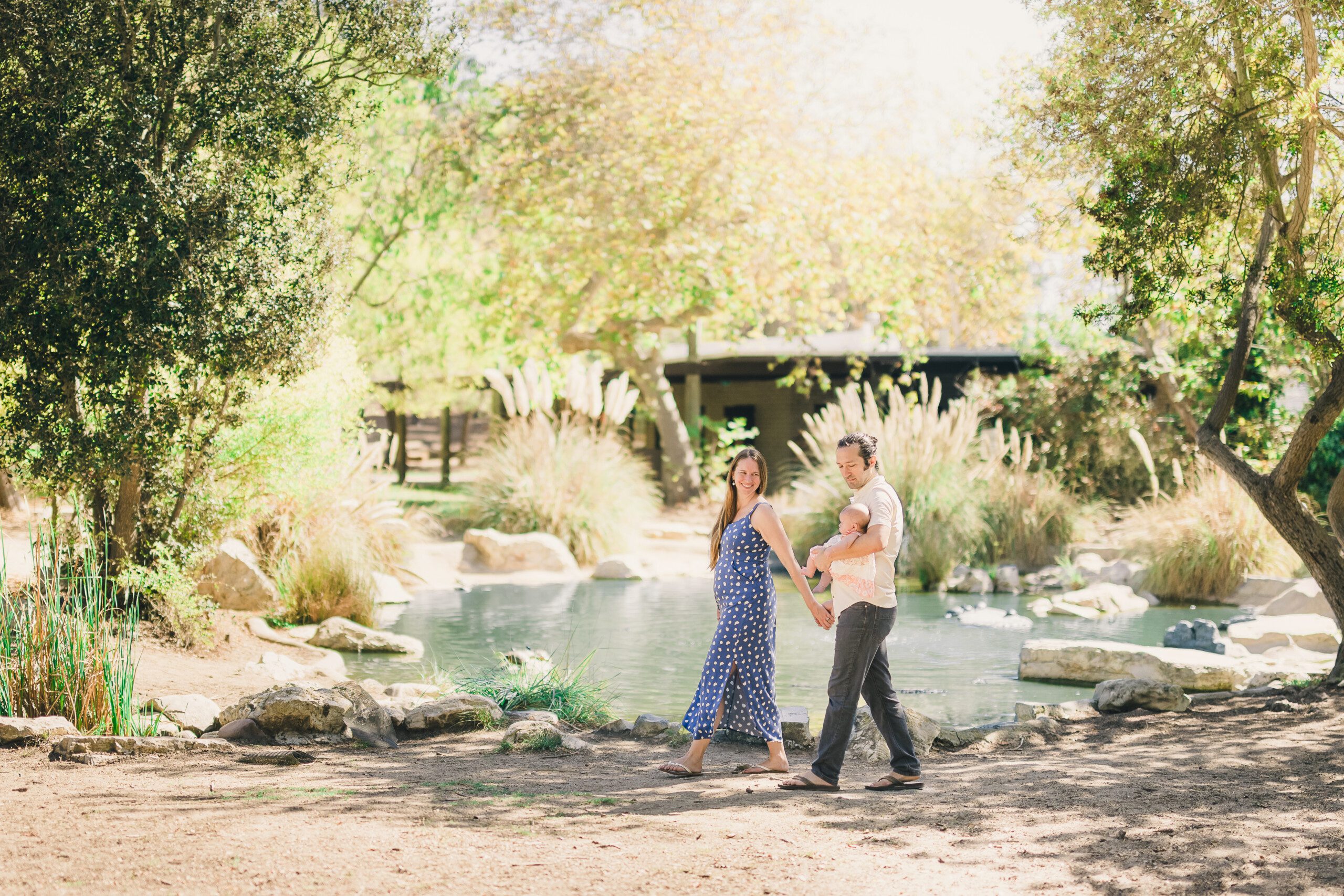 A family walks through Wilderness Park